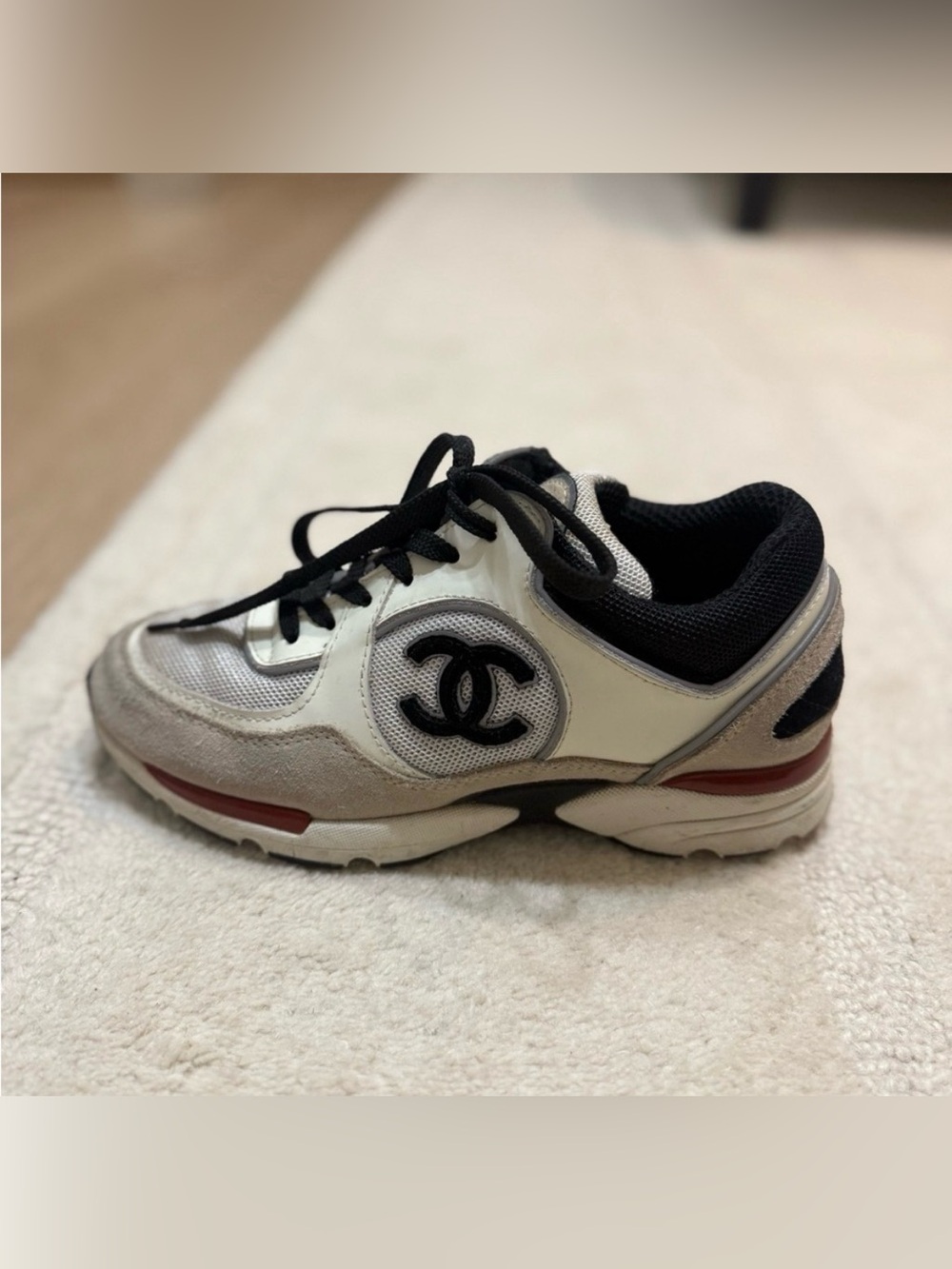 CHANEL Cream Black and Red Logo Women’s Sneakers